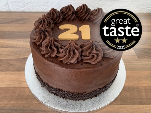 gluten-free-chocolate-fudge-birthday-cake-with-great-taste-logo-august-2025-001.jpg