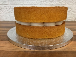 gluten-free-lemon-sponge-cake-8-inch-two-layer-naked-july-2023-5-001.jpg